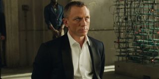 Daniel Craig looks annoyed while tied to a chair in Skyfall.
