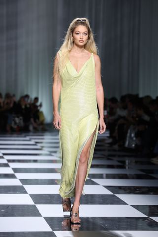 Gigi Hadid walks in Versace
