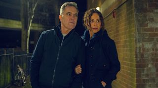 James Nesbitt and Minnie Driver look down an alleyway