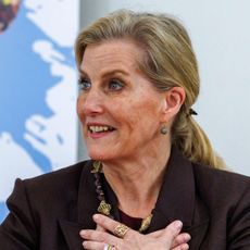 Duchess Sophie wearing a brown blazer crossing her hands in front of her chest