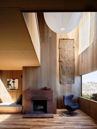 George Homsey's Sea Ranch Home in wood and natural forms that feel organic among trees