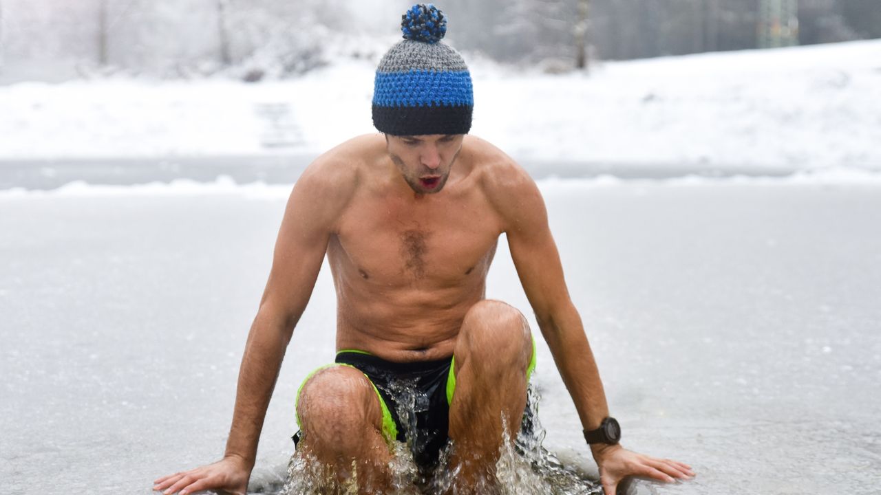 Man gets into ice bath