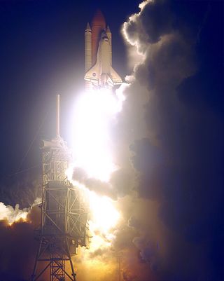 The Space Shuttle Endeavour lights up the night sky as it embarks on the first U.S. mission, STS-88, dedicated to the assembly of the International Space Station. Liftoff on Dec. 4, 1998, from Launch Pad 39A at NASA's Kennedy Space Center in Florida, occu