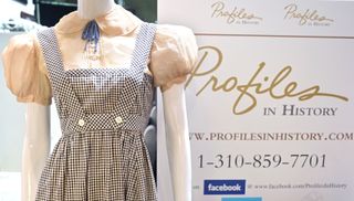 Dorothy Gale's screen used dress from the 1939 film "The Wizard of Oz" on display at the Profiles in History auction house on August 28, 2019 in Calabasas, California ahead of "The Icons and Legends of Hollywood Auction" on September 25 and 26.