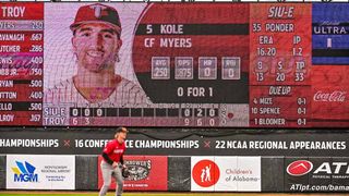 The new Daktronics scoreboard for Troy college baseball shines bright behind the shortstop.