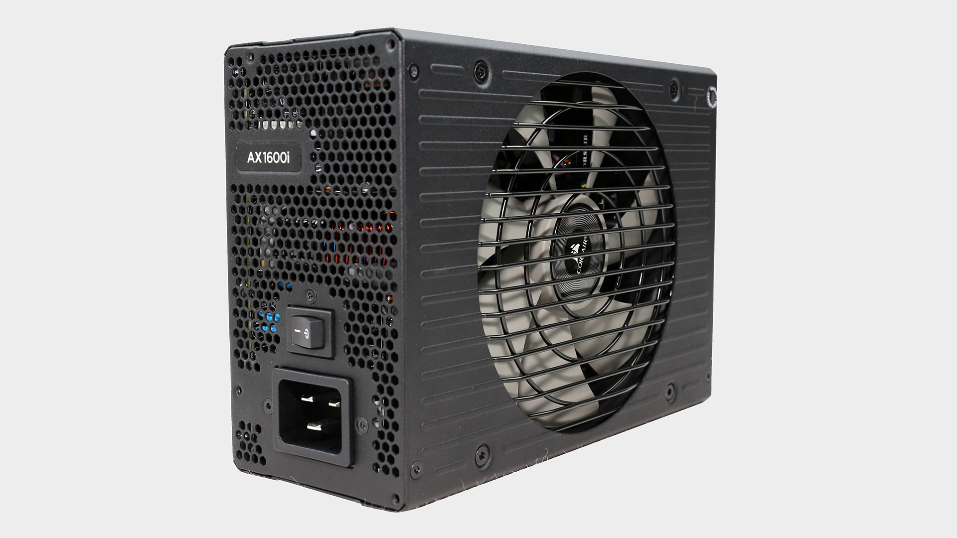Corsair AX1600i power supply with cables.