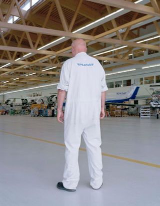 man with white jumpsuit