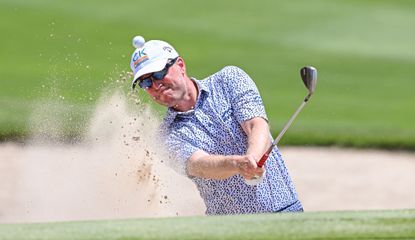 Matt Ford hits a bunker shot