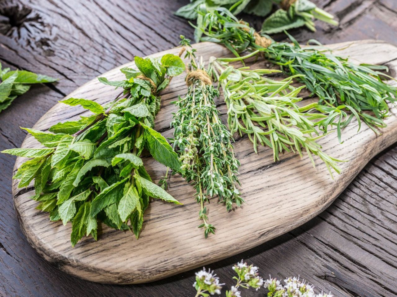 Garden Herbs On Wooden Cutting Board