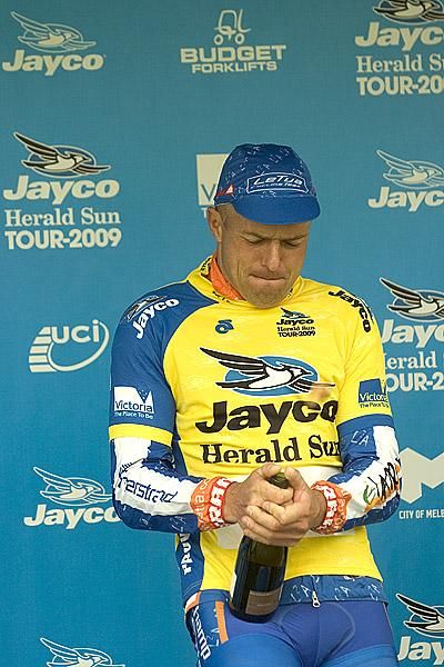 The cork flys as Jaan Kirsipuu (Le Tua) cracks the champers on the podium in Ballarat.