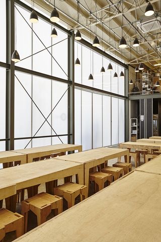 The refectory table and benches out of unvarnished marine plywood