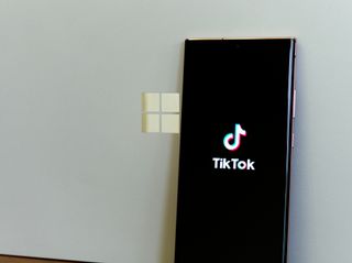 TikTok offset against a Microsoft logo