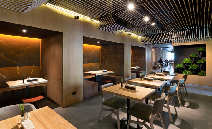 A warm palette of sandstone, blond wood and olive-green fabric brings to mind the Crimean sea