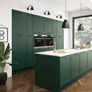 kitchen room with marble worktop and dark green cabinets