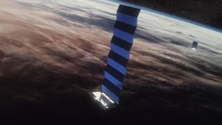 An artist's illustration of SpaceX's Starlink internet satellites in orbit. The company has won a U.S. military contract for missile-warning satellites.