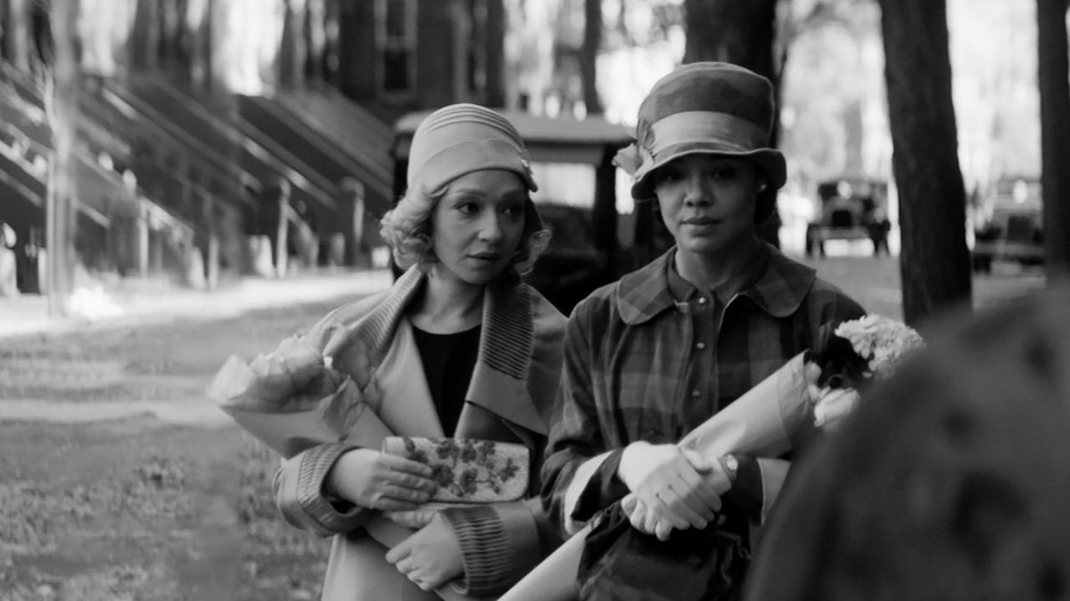 Irene and Clare walk side by side in Passing