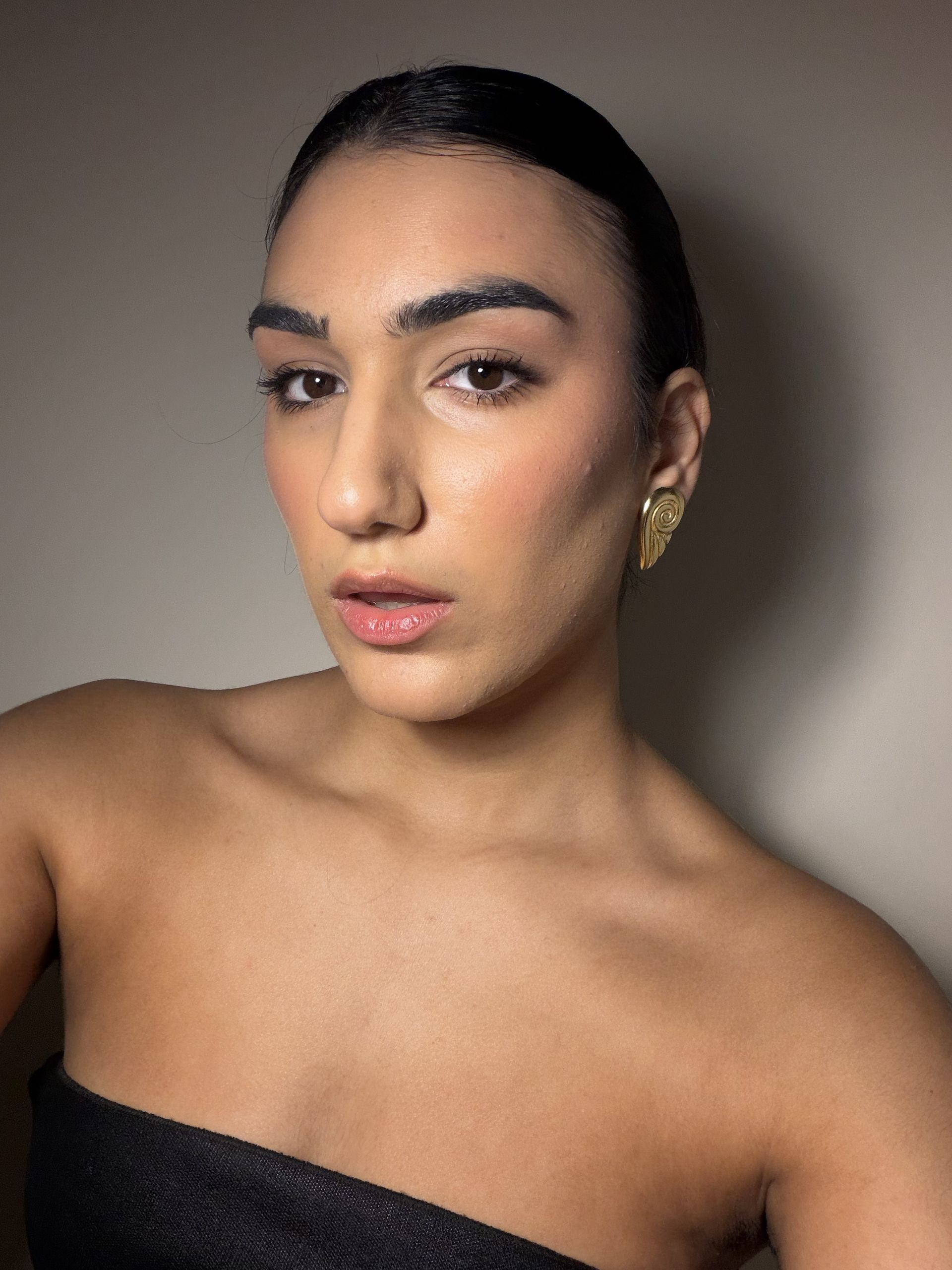Who What Wear editor Josephine Hadjiloucas wearing Ysso Ion Earrings