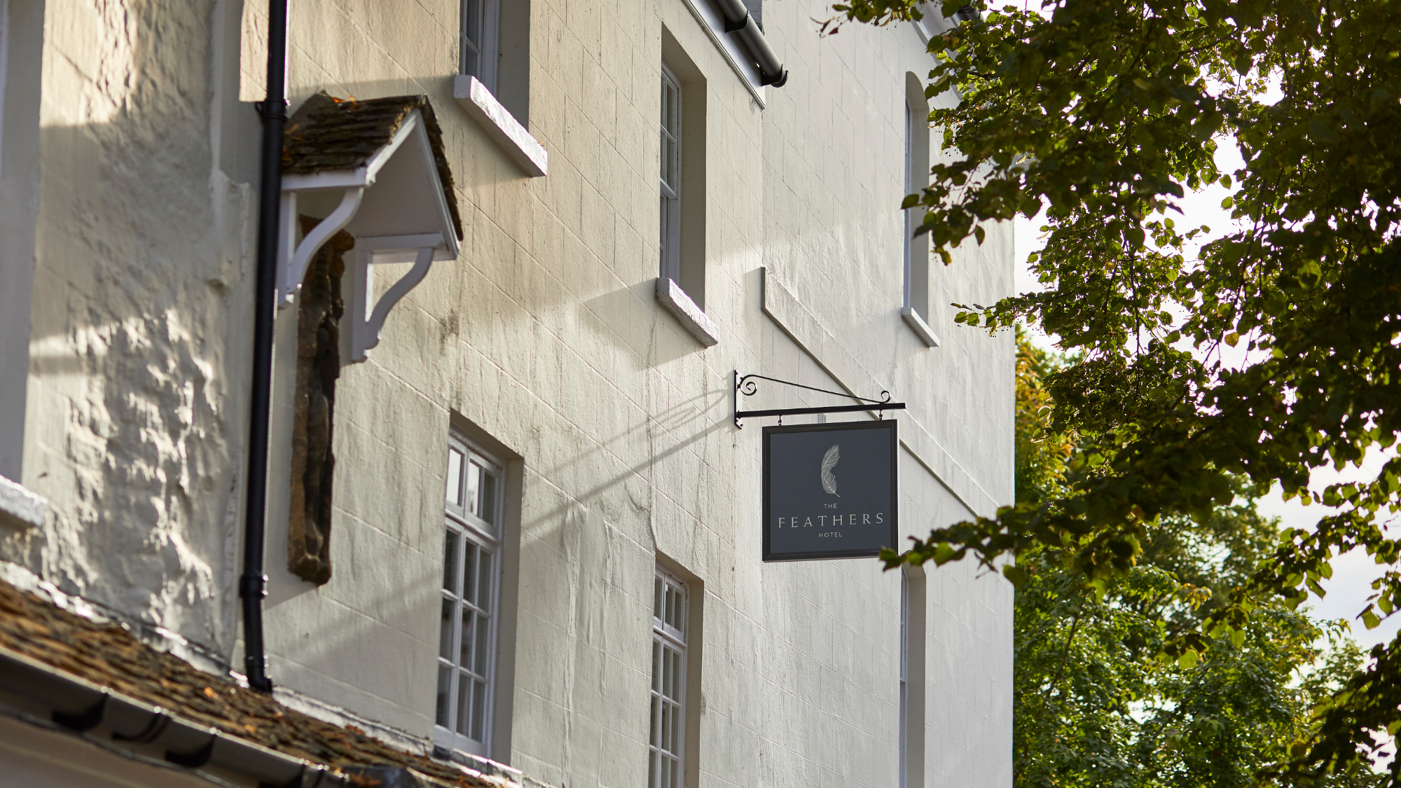 The Feathers exterior and sign
