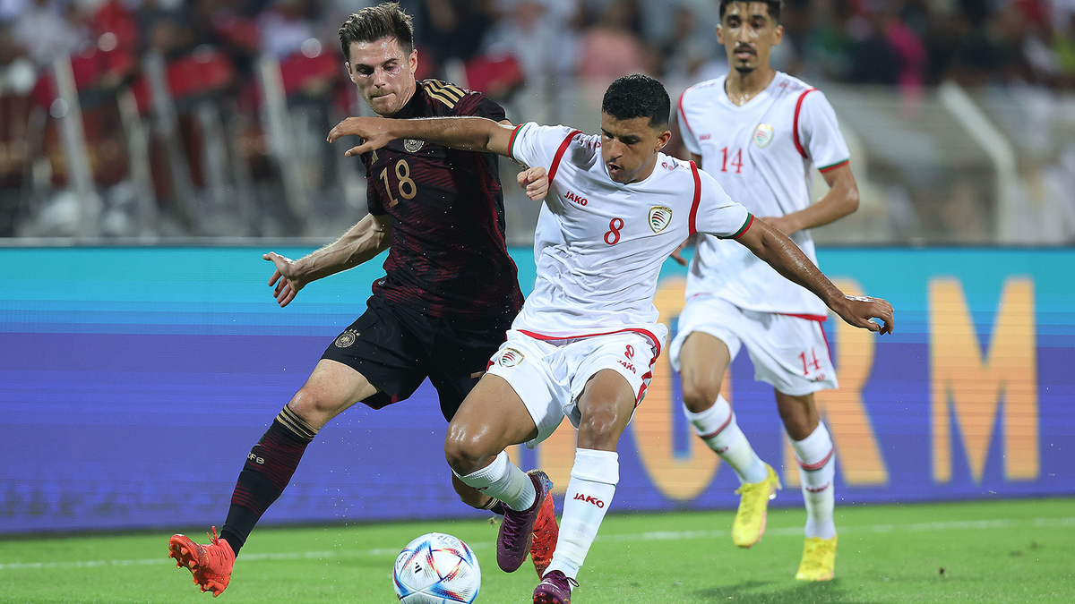 Germany&#039;s Jonas Hoffman (L) representing the team in a friendly against Oman.