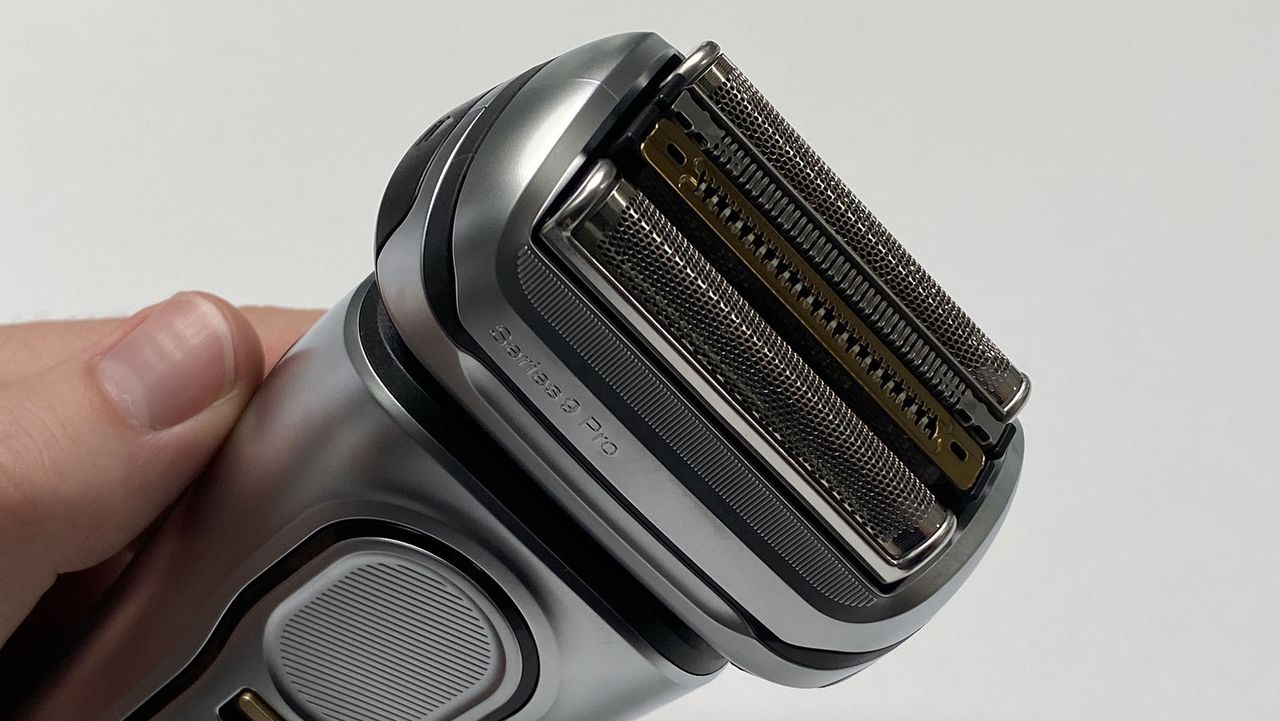 Braun Series 9 Pro rotary shaver in reviewer's hand