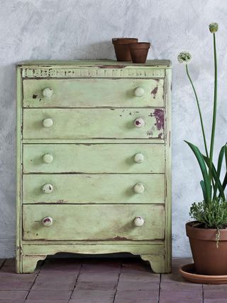 Chest of drawers with distressed vintage paint effect