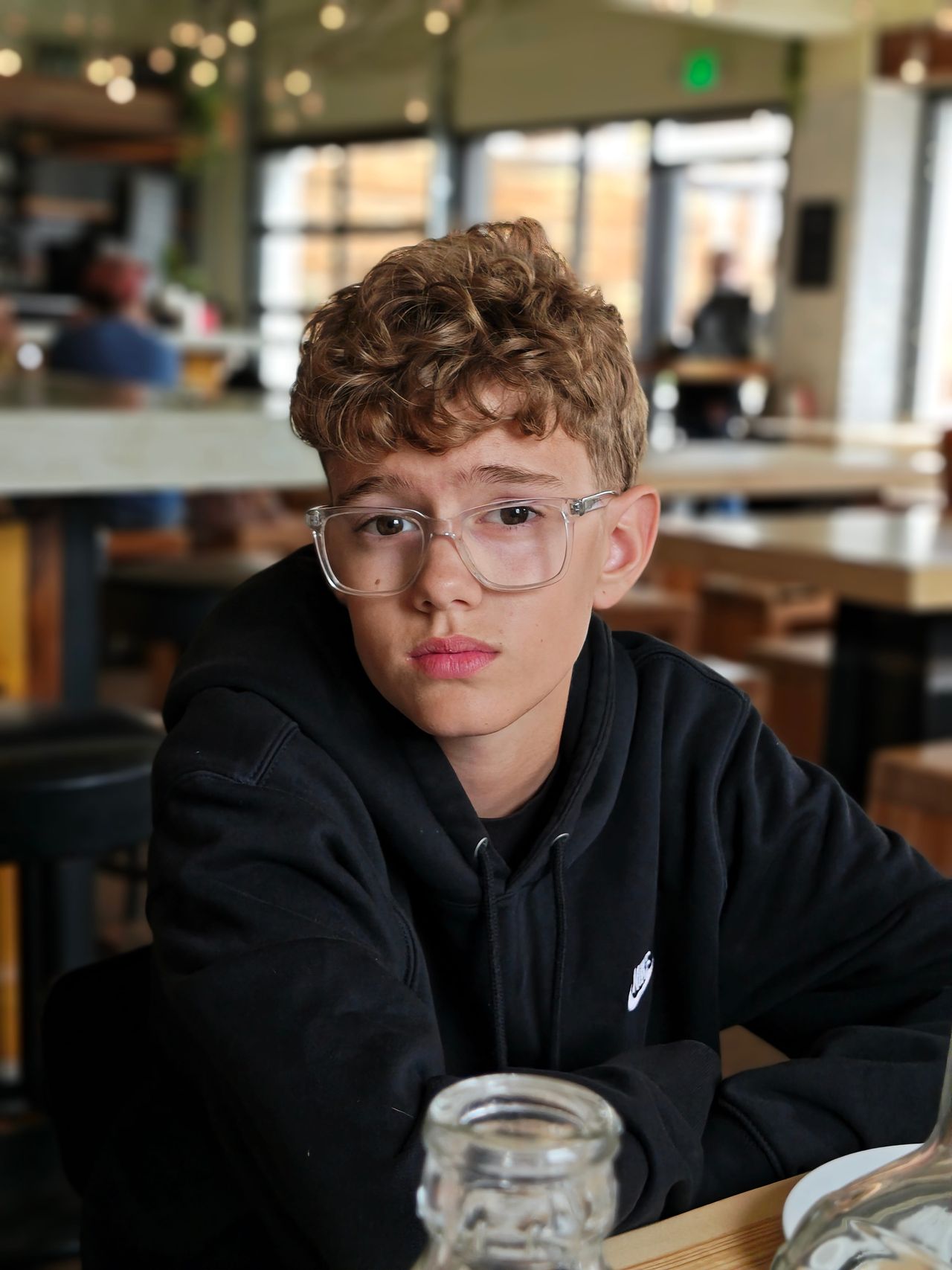 Portrait photos of a family at a restaurant and outdoor concert