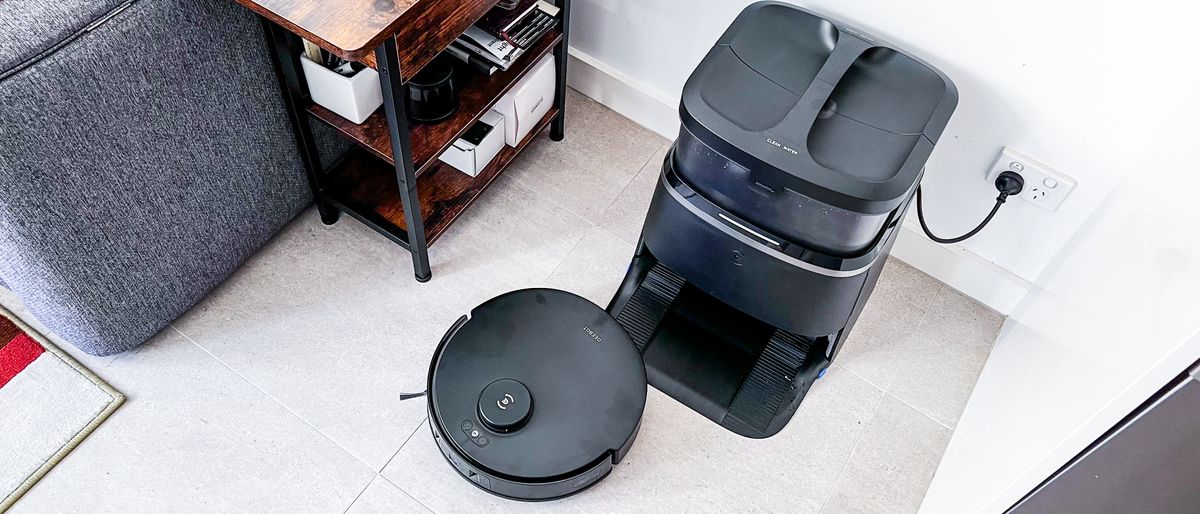 Ecovacs Deebot T30 Omni robot vacuum pulling out of its clean station