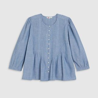 A cutout of a chambray blouse by Levi's