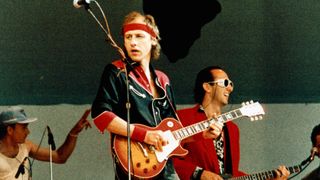 Dire Straits’ Mark Knopfler onstage at Live Aid in 1985