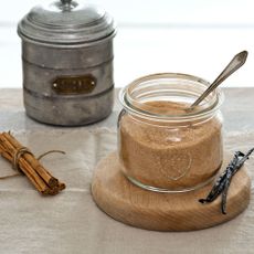 kitchen spices with cinnamon powder in glass jar