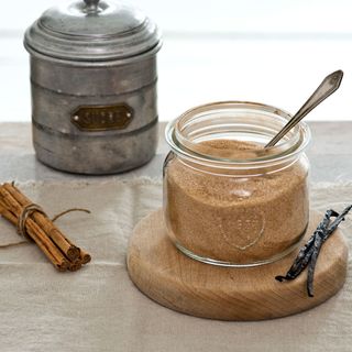 kitchen spices with cinnamon powder in glass jar