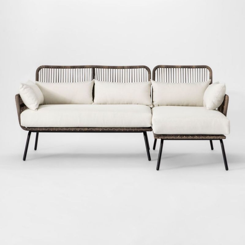 A Target wicker sectional with linen cushions for the best outdoor furniture brands.