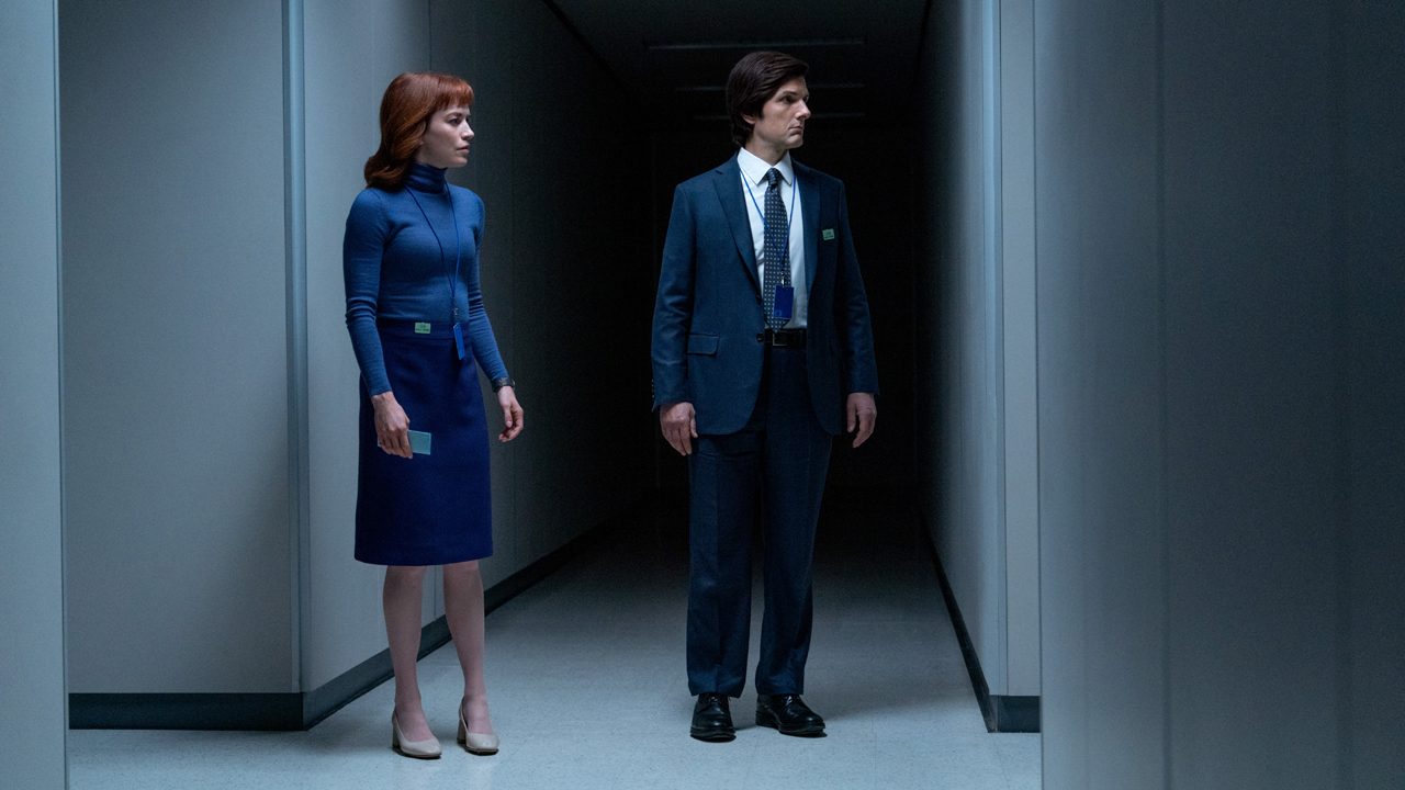 Helly and Mark stand in a dark Lumon Industries hallway in Severance season 2