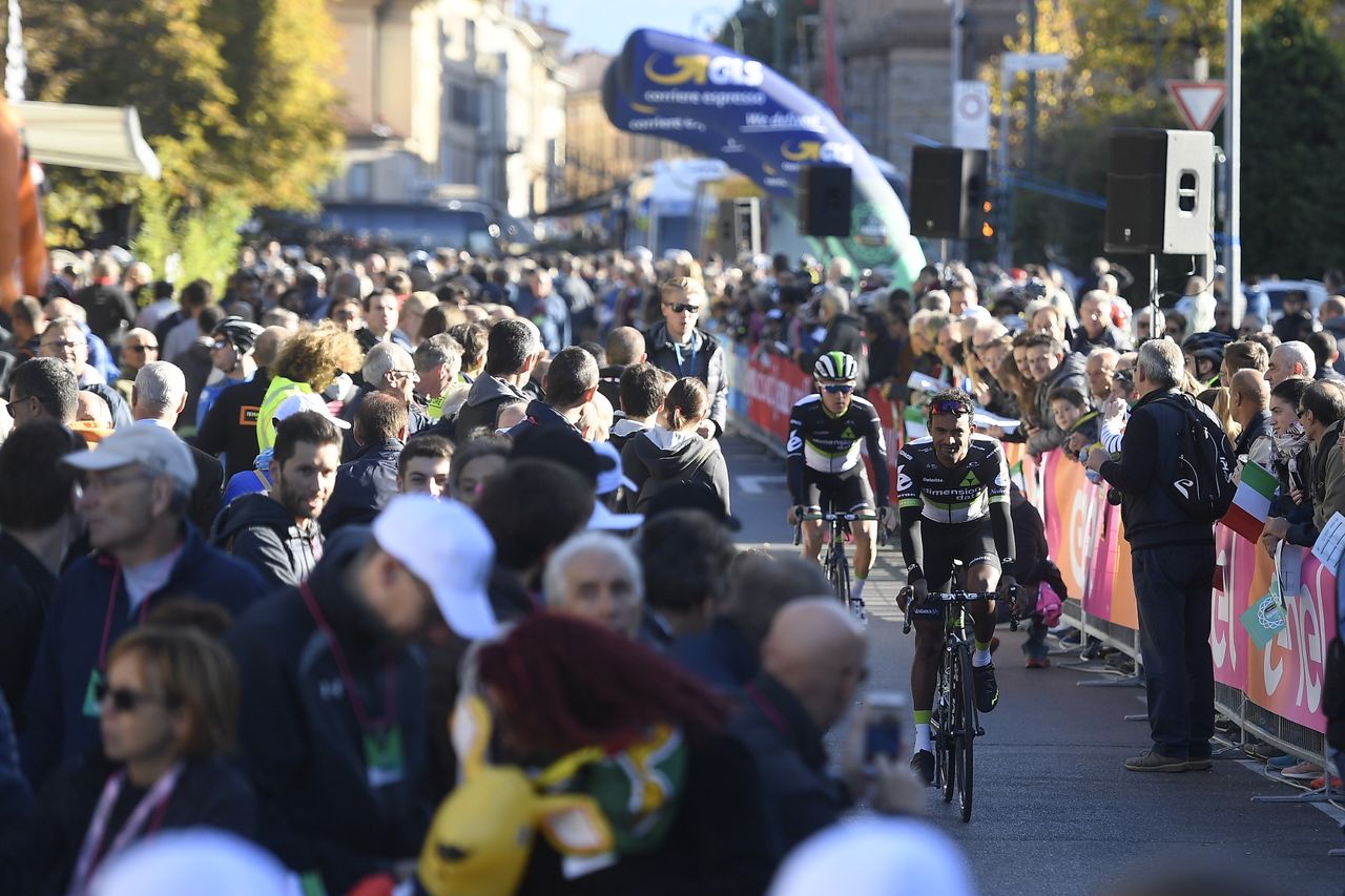 Mekseb Debesey is followed by Serge Pauwels as they go to the start