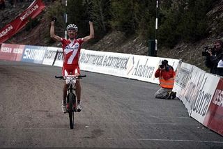 Christoph Sauser celebrates his first win