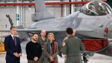 Ukraine President Volodymyr Zelenskyy examines F-16 in Belgium
