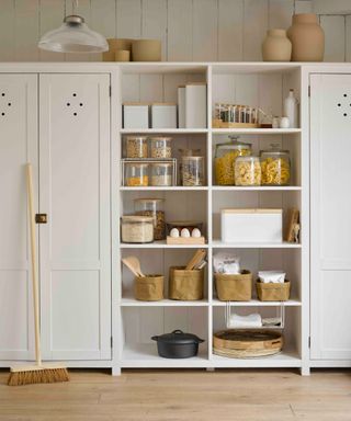 White pantry with open shelves