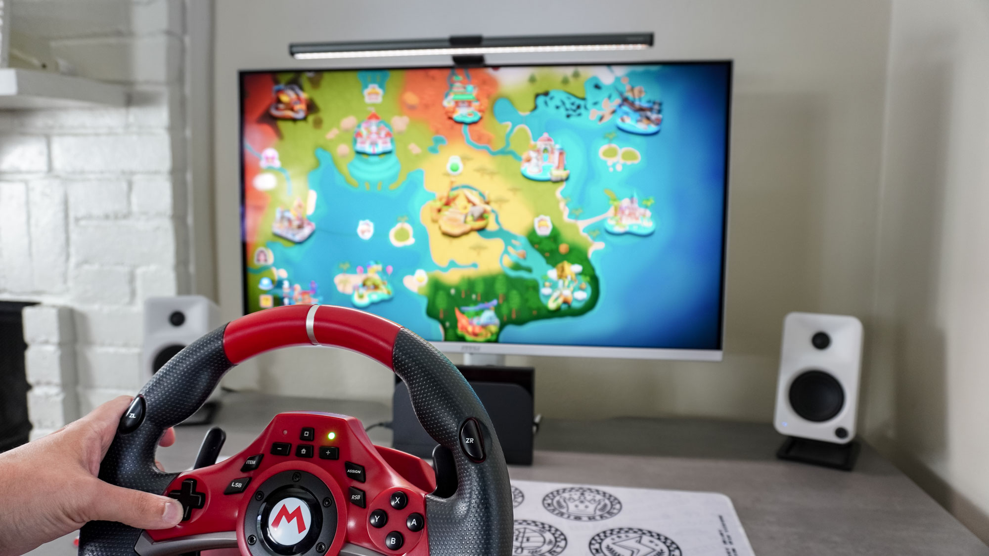 Navigating around Mario Kart World's overworld map using the D-pad on the Hori Pro Deluxe racing wheel