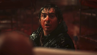a blood drenched Austin Abrams in Resident Evil