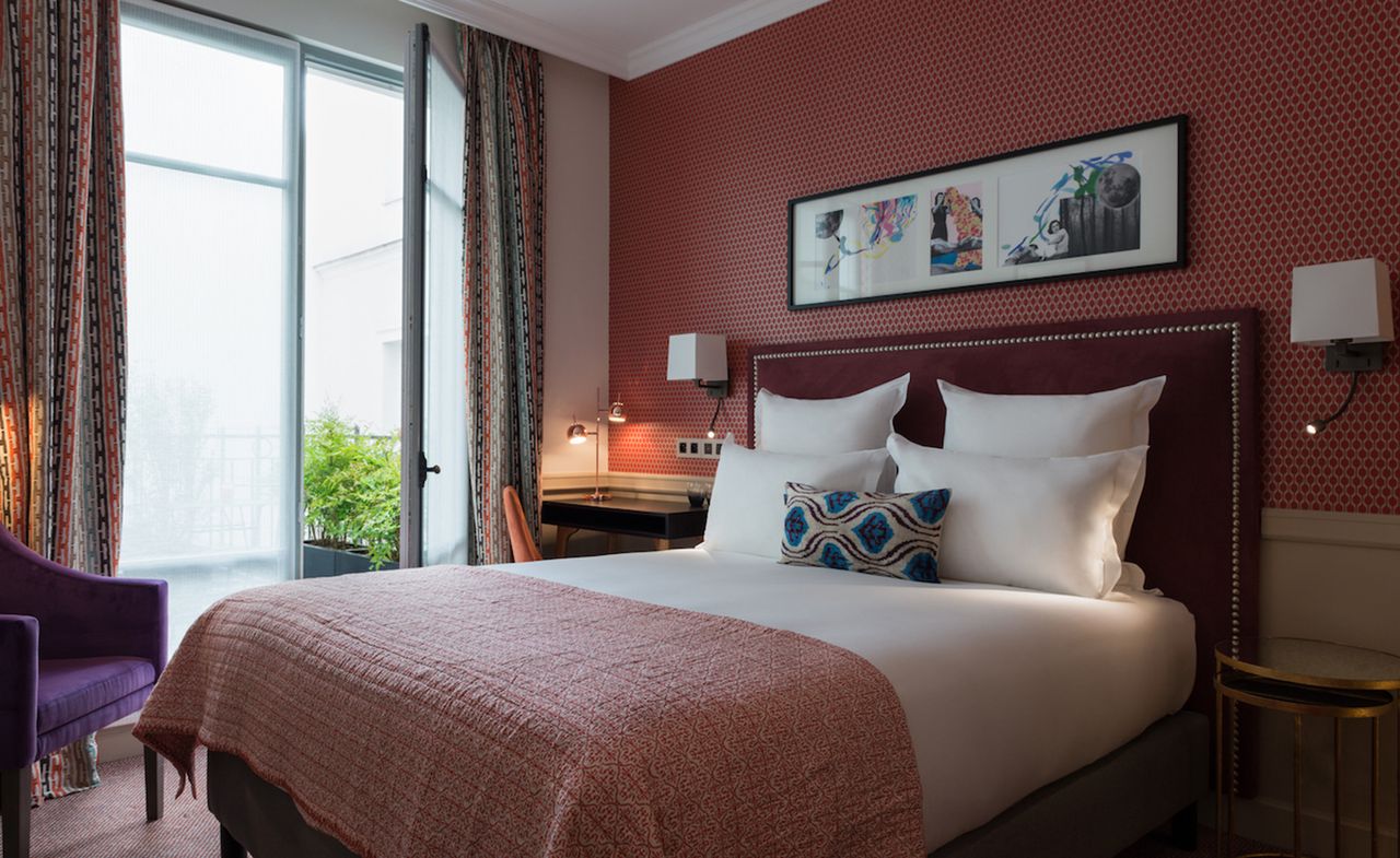  Parisian hotels, Adèle &amp; Jules bedroom with white cushions and long curtain