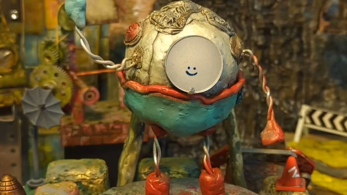 Close up of Mashina, the protagonist of Mashina, a little round robot with a tiny smiley face in a world of garbage