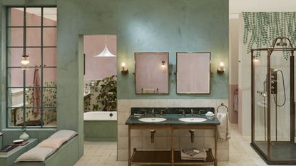 Light green and pink bathroom suite with dark green marble sink