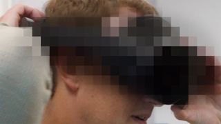 A censored Project Cambria on Mark Zuckerberg's head
