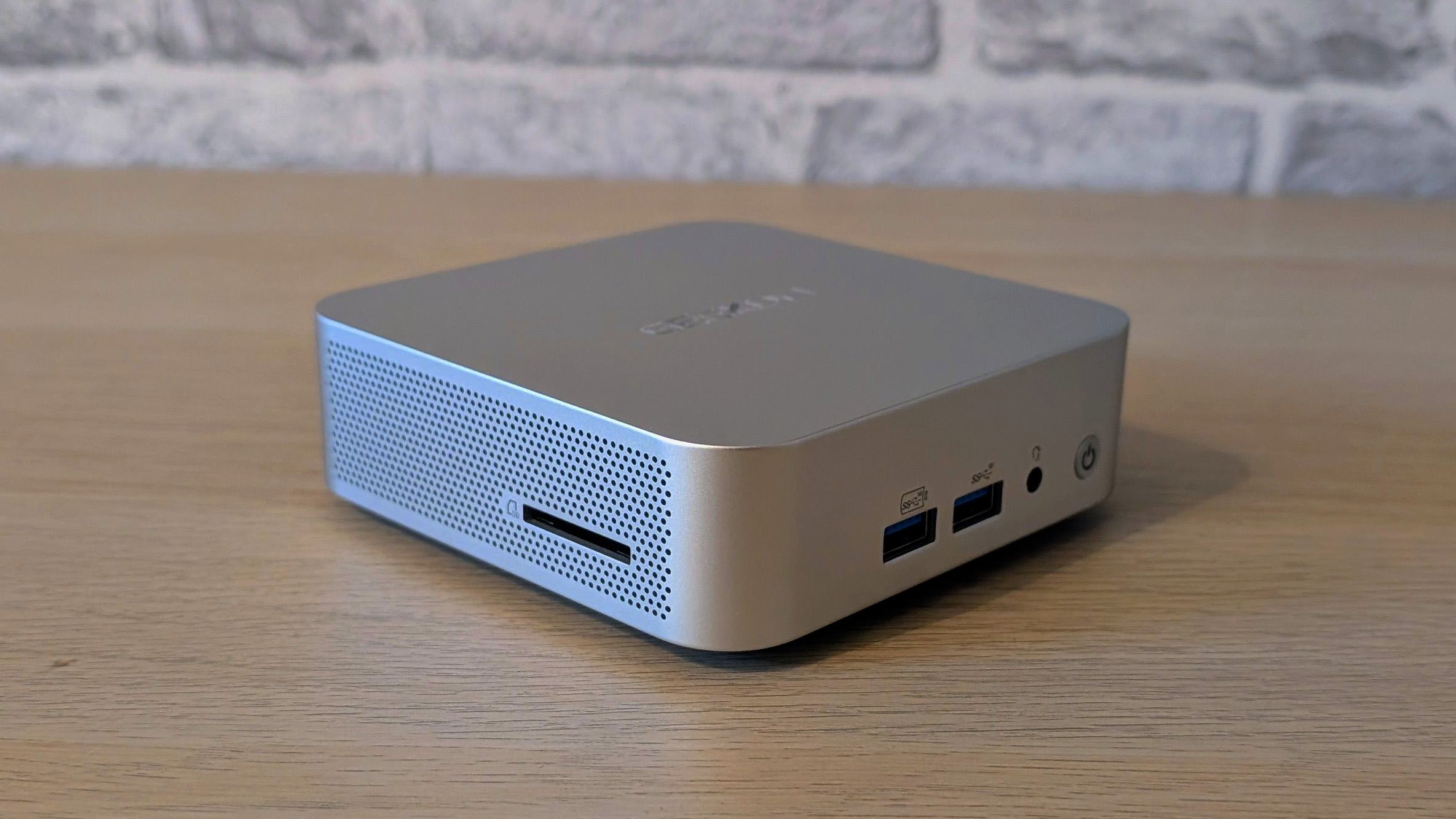The Geekom A8 AI mini PC on a desk