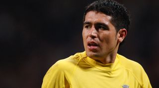 MILAN, ITALY - MARCH 29: Juan Roman Riquelme of Villarreal in action during the UEFA Champions League Quarter-final first leg match between Inter Milan and Villarreal at the Stadio Giuseppe Meazza on March 29, 2006 in Milan, Italy. (Photo by Etsuo Hara/Getty Images)