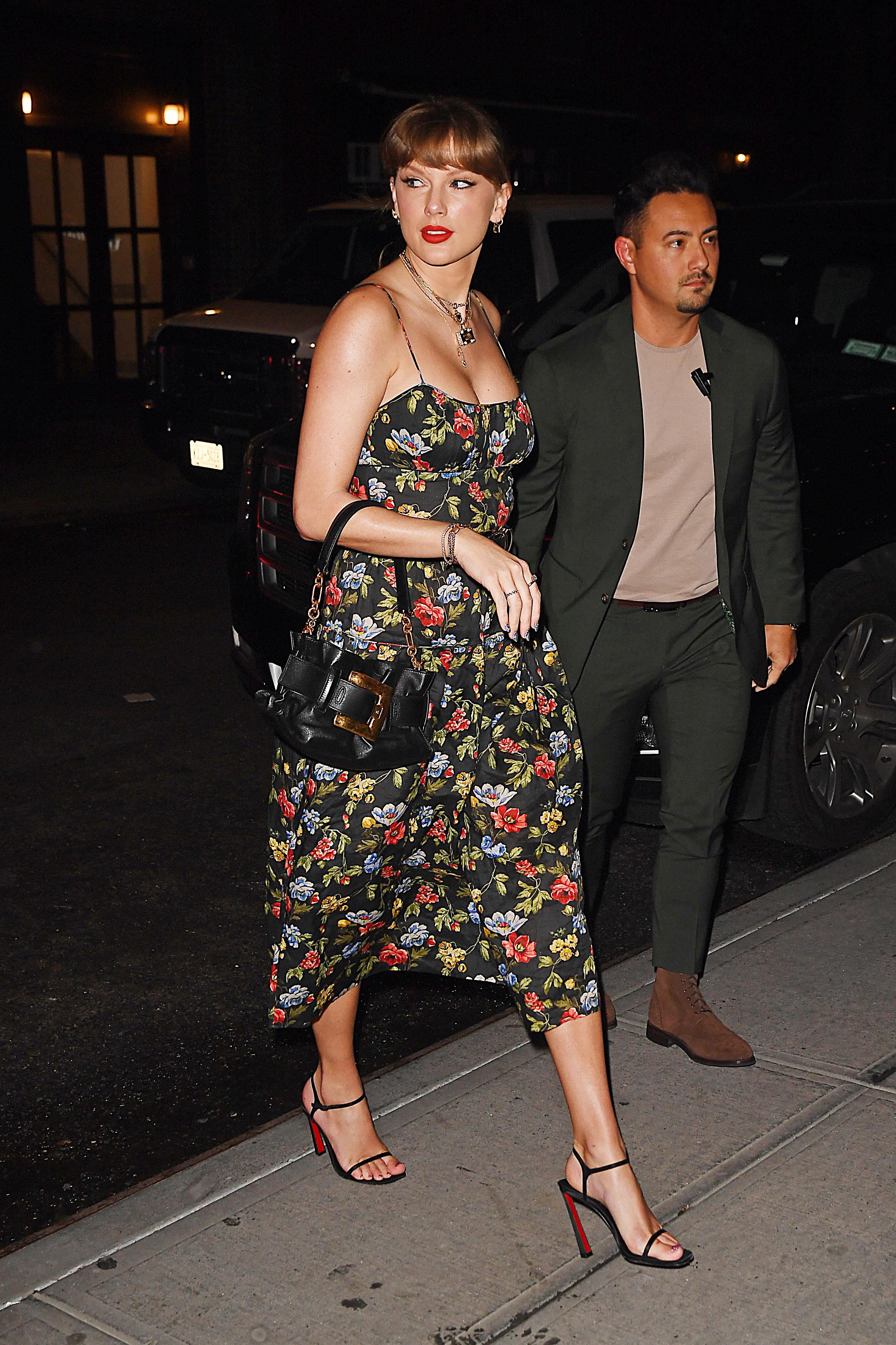 Taylor Swift in New York City wearing a Dôen dress