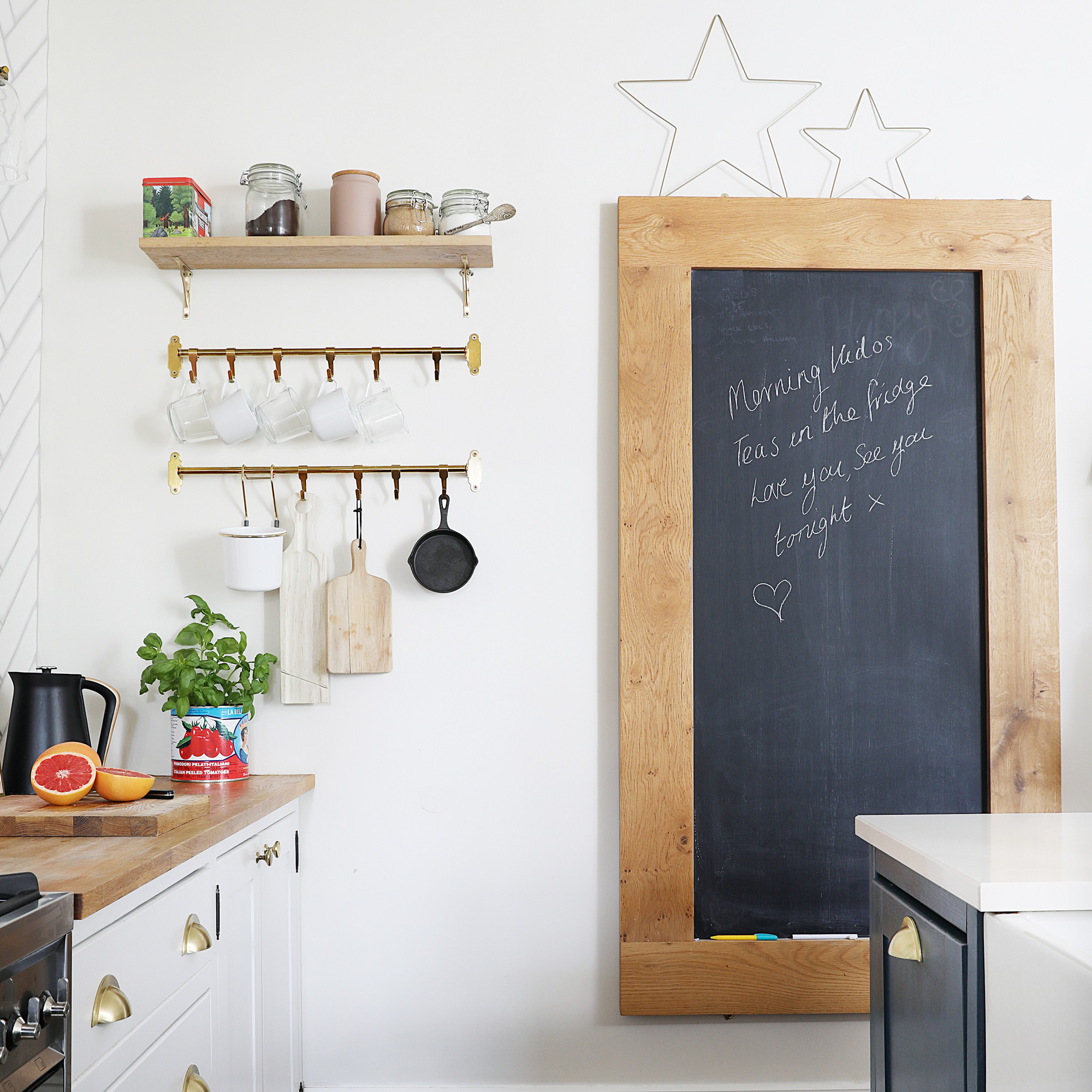 Victorian property revamp with open plan kitchen living area with chalkboard for messages