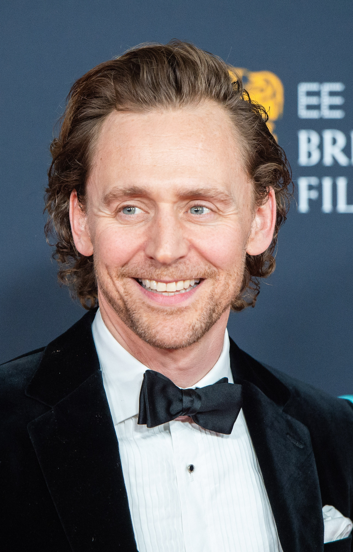 Tom Hiddleston attends EE British Academy Film Awards