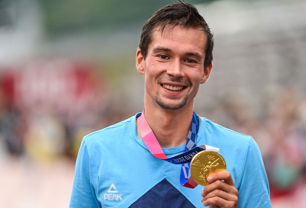 Gold medalist Slovenias Primoz Roglic poses on the podium after the mens cycling road individual time trial during the Tokyo 2020 Olympic Games at the Fuji International Speedway in Oyama Japan on July 28 2021 Photo by Ina FASSBENDER AFP Photo by INA FASSBENDERAFP via Getty Images