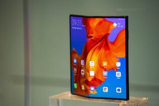BARCELONA, SPAIN - FEBRUARY 26:The new Huawei Mate X mobile phone is shown on display at the Huawei booth on day 2 of the GSMA Mobile World Congress 2019 on February 26, 2019 in Barcelona, Sp